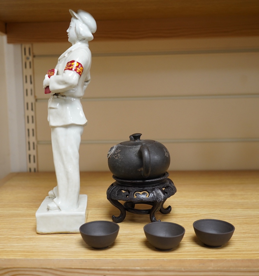 A Chinese cultural revolution Communist party figure together with a Mao teapot and three tea bowls, largest 31cm high. Condition - good